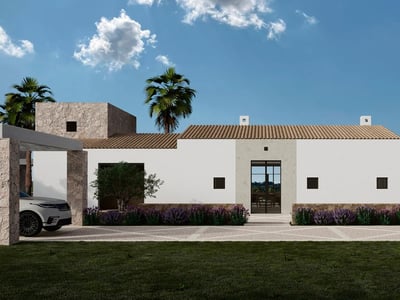 Vue extérieure d'une villa blanche moderne avec accents en pierre, toit en tuiles et lavande sous un ciel bleu.