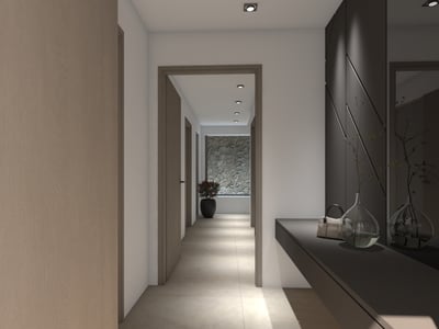 Pasillo elegante con puertas de madera clara, consola oscura, espejo grande y una pared de piedra al fondo.