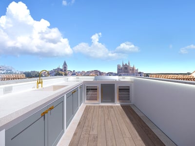 Außenküche auf dem Dach mit grauen Schränken, goldenem Wasserhahn und Blick auf eine Kathedrale.