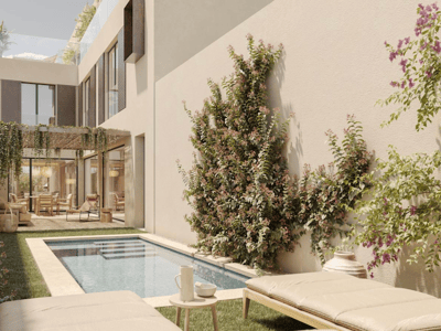 A sleek plunge pool in a Mediterranean-style garden with sun loungers, climbing flowers, and a shaded patio.