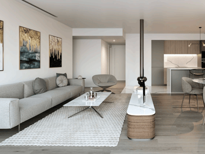 Amplio salón moderno con sofá gris, mesa de centro de mármol, zona de comedor y cocina minimalista integrada.