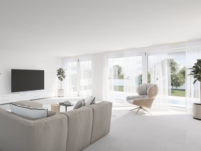 Bright living room with beige sectional sofa, floor-to-ceiling windows, and garden view with pool.