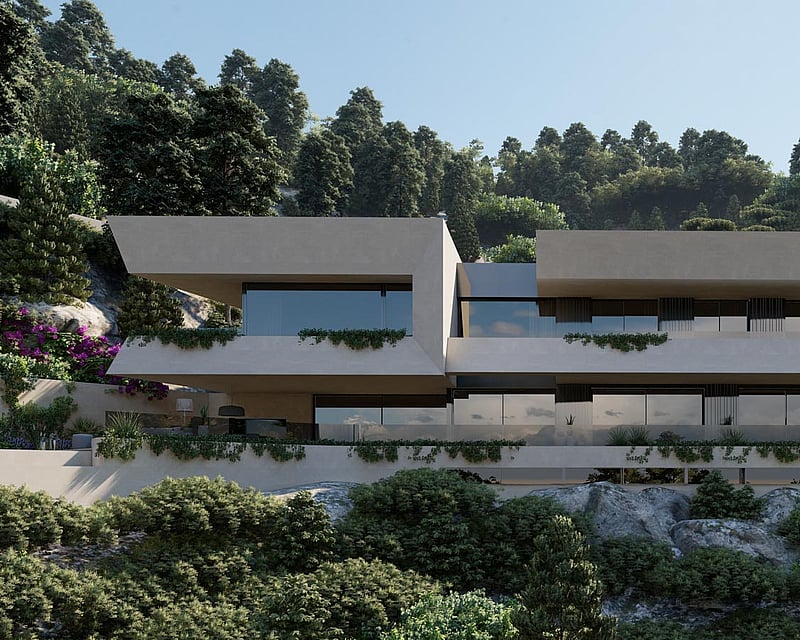 Modern two-story villa with white cantilevered levels, glass railings, and lush green landscaping on a wooded hillside.
