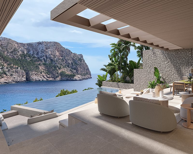 Shaded terrace with designer lounge seating and an infinity pool overlooking coastal cliffs and the blue ocean.