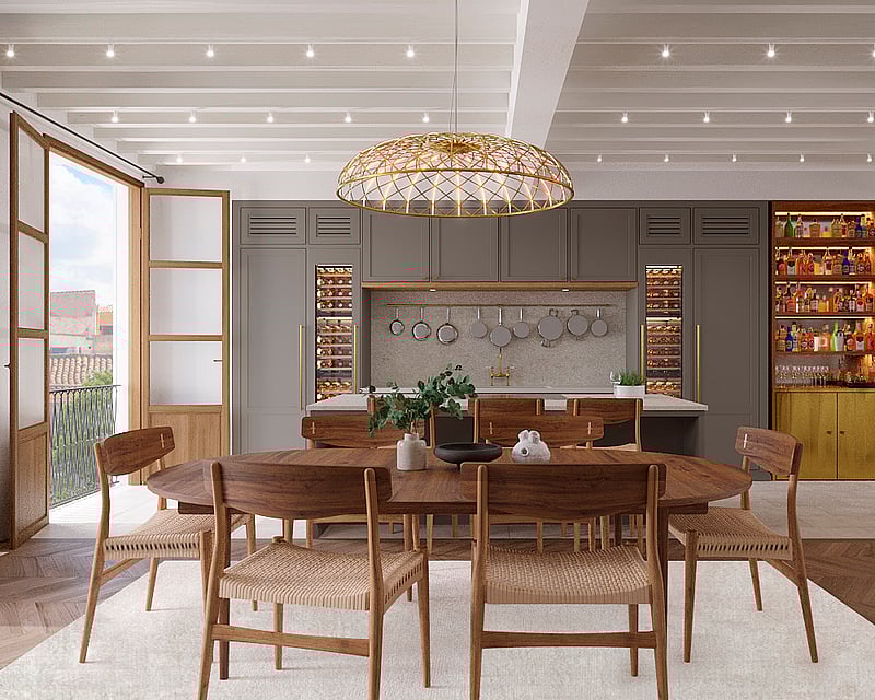 Elegant dining room with a wooden table, woven chairs, a large gold pendant light, and a modern kitchen with wine fridges.