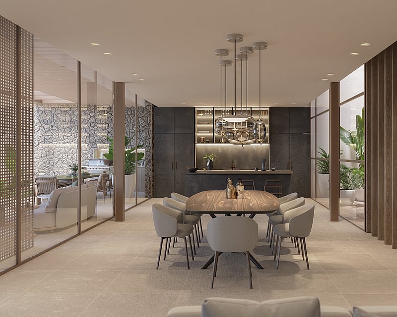 Elegant dining room featuring a wooden table, designer pendant lights, and floor-to-ceiling glass walls.