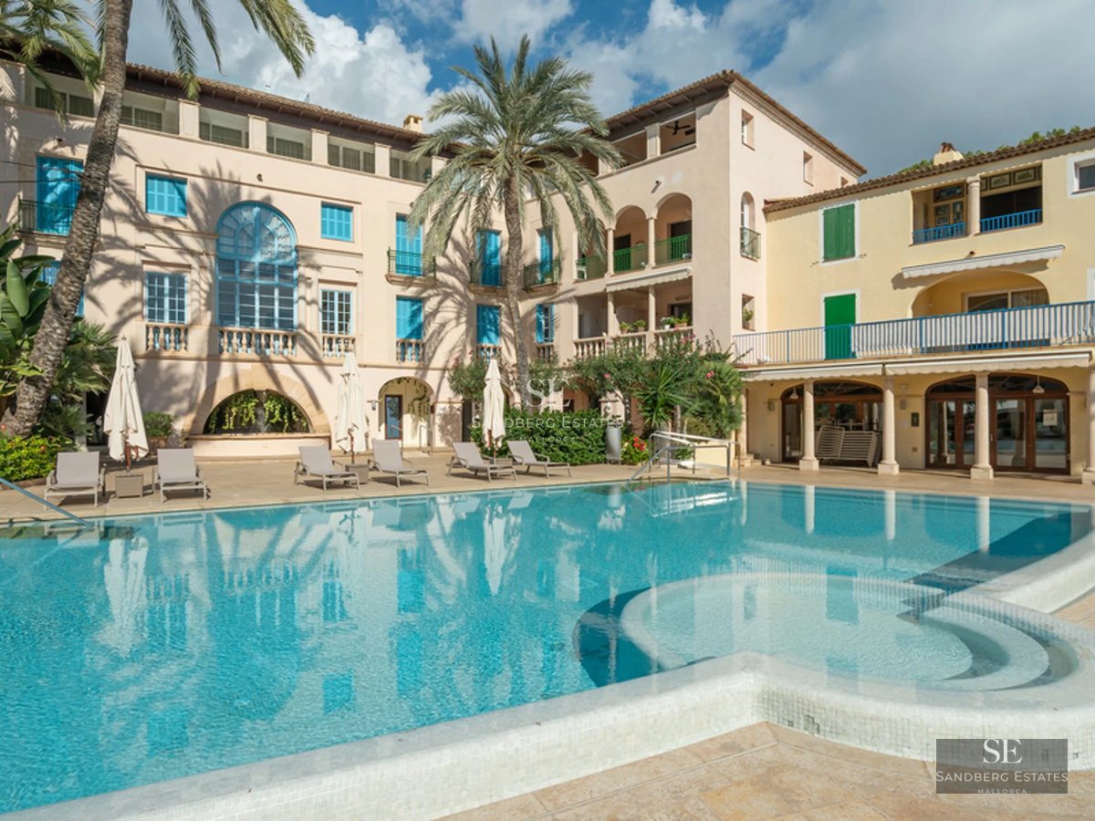 Expansive terrace featuring an infinity pool and ocean views. Modern design, stylish furniture, ambient lighting.