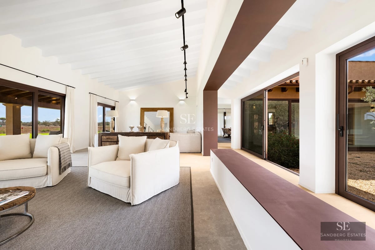 Spacious terrace with pool, sun loungers, and panoramic views. Modern architecture, natural lighting, and minimalist design.