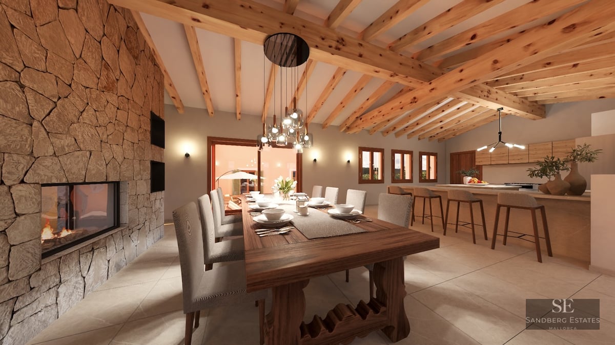 Spacious dining room featuring a massive wooden table, large stone fireplace, and exposed timber ceiling beams.