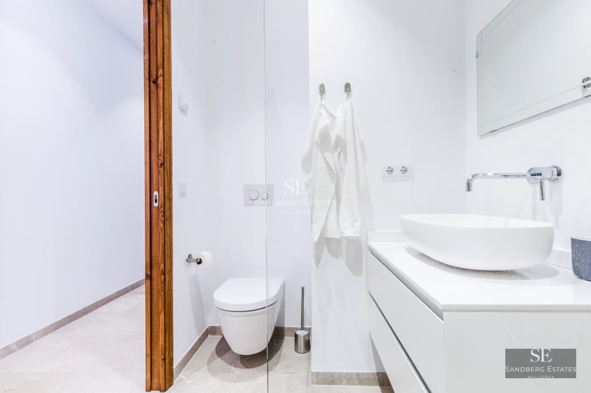 Pool view, manicured lawn, modern architecture with large windows, ambient lighting. Luxurious exterior design.