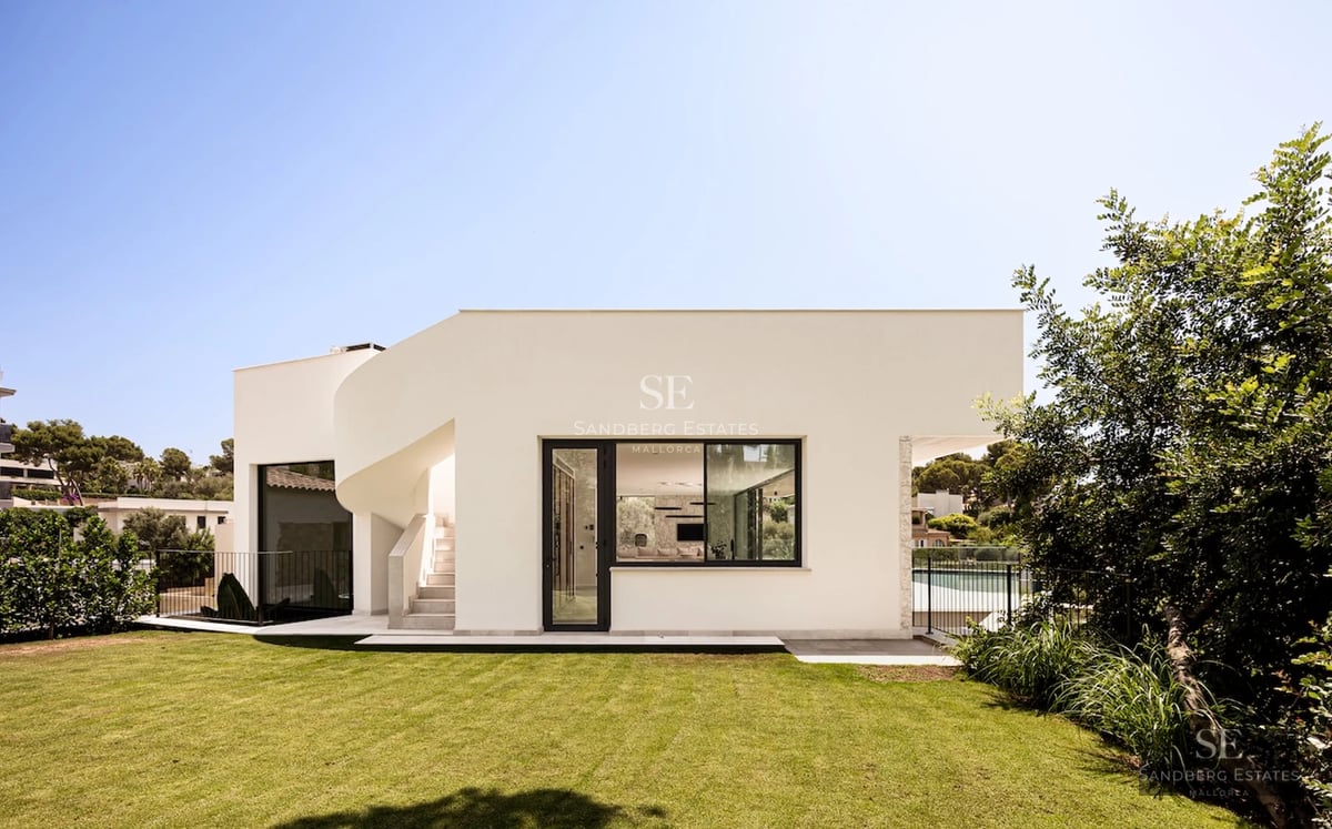 Spacious terrace with pool and views. Modern furniture, ambient lighting, and lush greenery. Elegant and relaxing design.