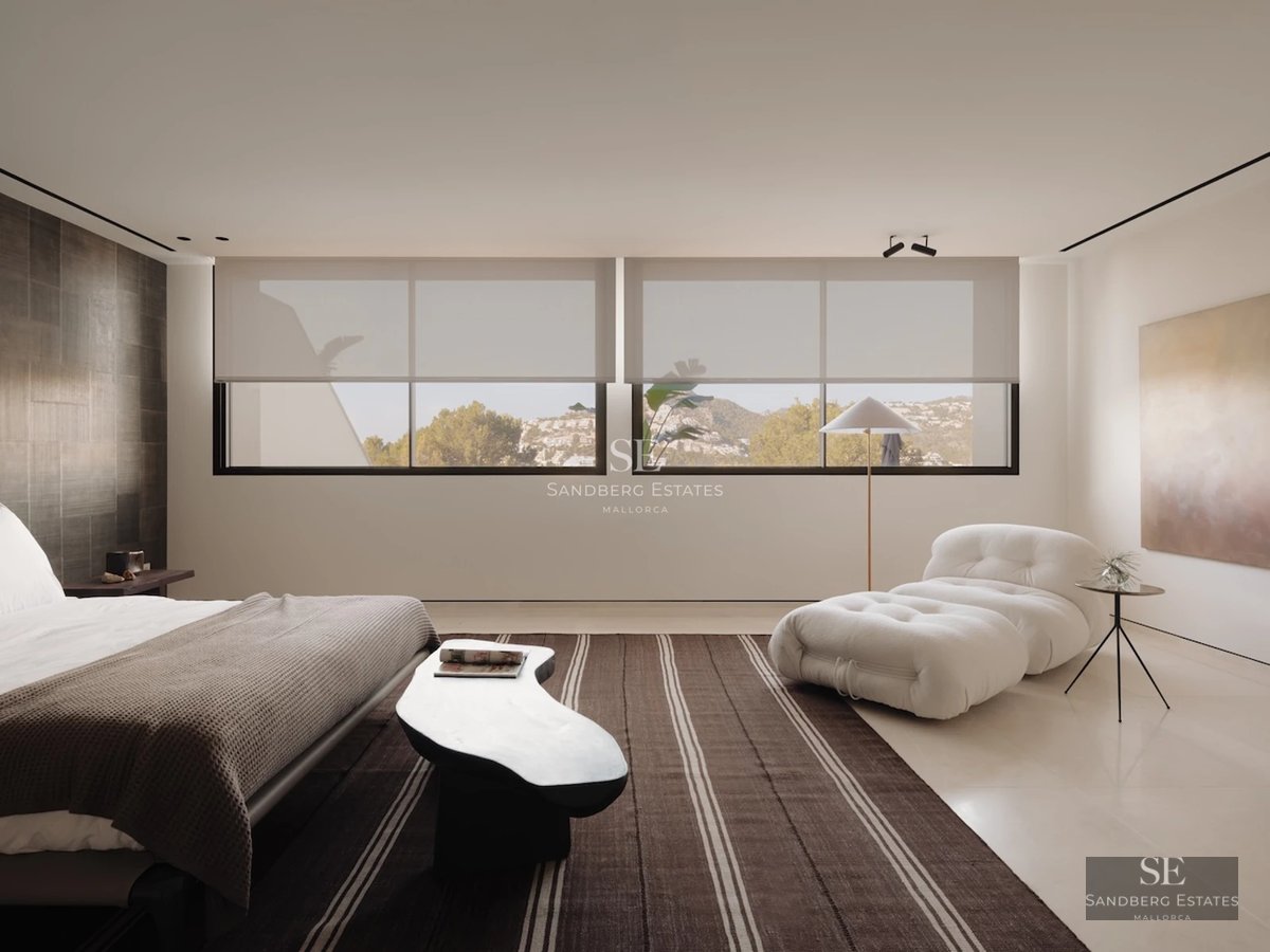 Spacious living room with floor-to-ceiling windows and sea view. Modern design, light wood floors, elegant furniture. Abundant natural light.