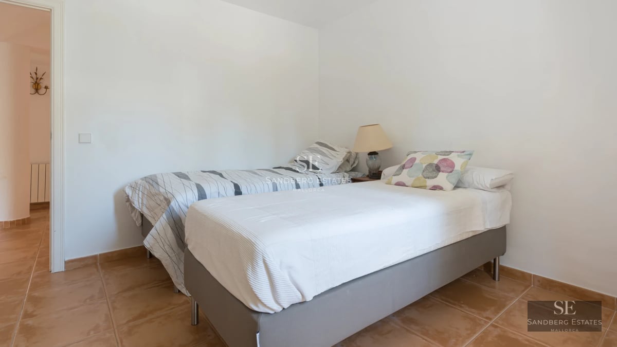 Spacious terrace with pool and seating area. Modern design with unobstructed views and abundant natural light.