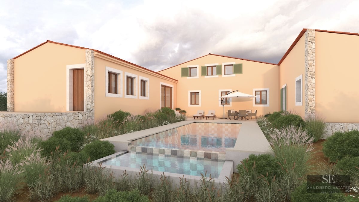 Mediterranean villa with peach-colored walls and a multi-level swimming pool surrounded by ornamental grasses.