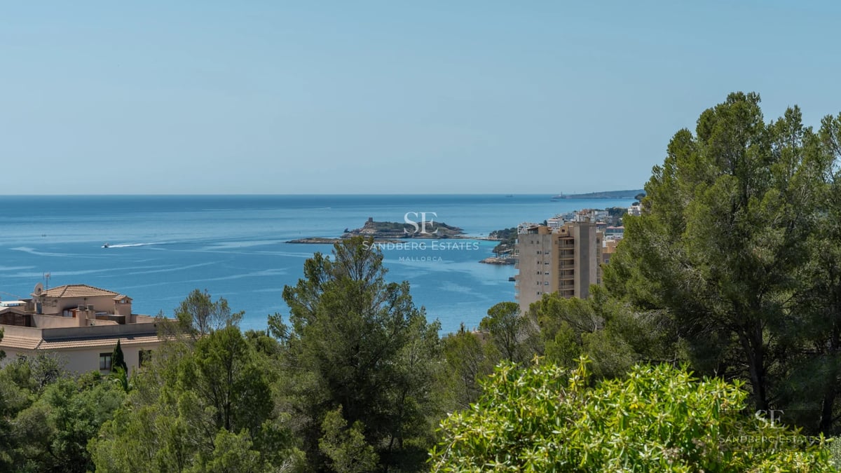 Exterior of a modern villa with an infinity pool, lush garden, and spacious terraces. Minimalist architecture with large windows.