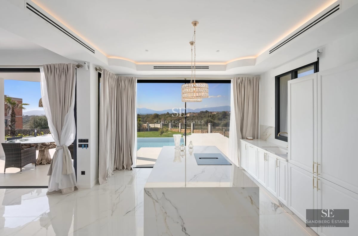 Exterior view of a luxurious house with an infinity pool, lush garden, and modern architecture. Soft ambient lighting.