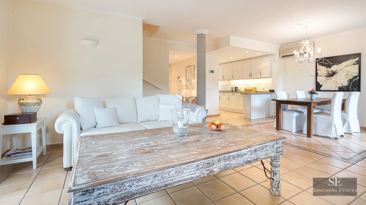 Expansive terrace with pool, sun loungers, and panoramic views. Modern design, luxurious finishes, and relaxing ambiance.