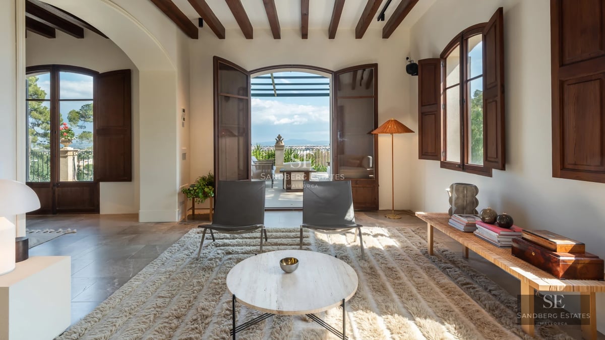 Exterior of modern villa with pool, garden, and spacious terraces. Elegant design and high-quality finishes.