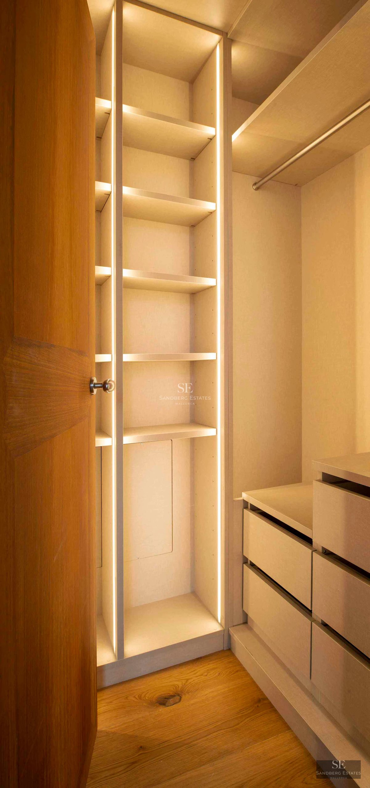 Spacious balcony with panoramic sea views. Modern design, glass railing, and elegant furniture. Ideal for relaxing and enjoying the scenery.