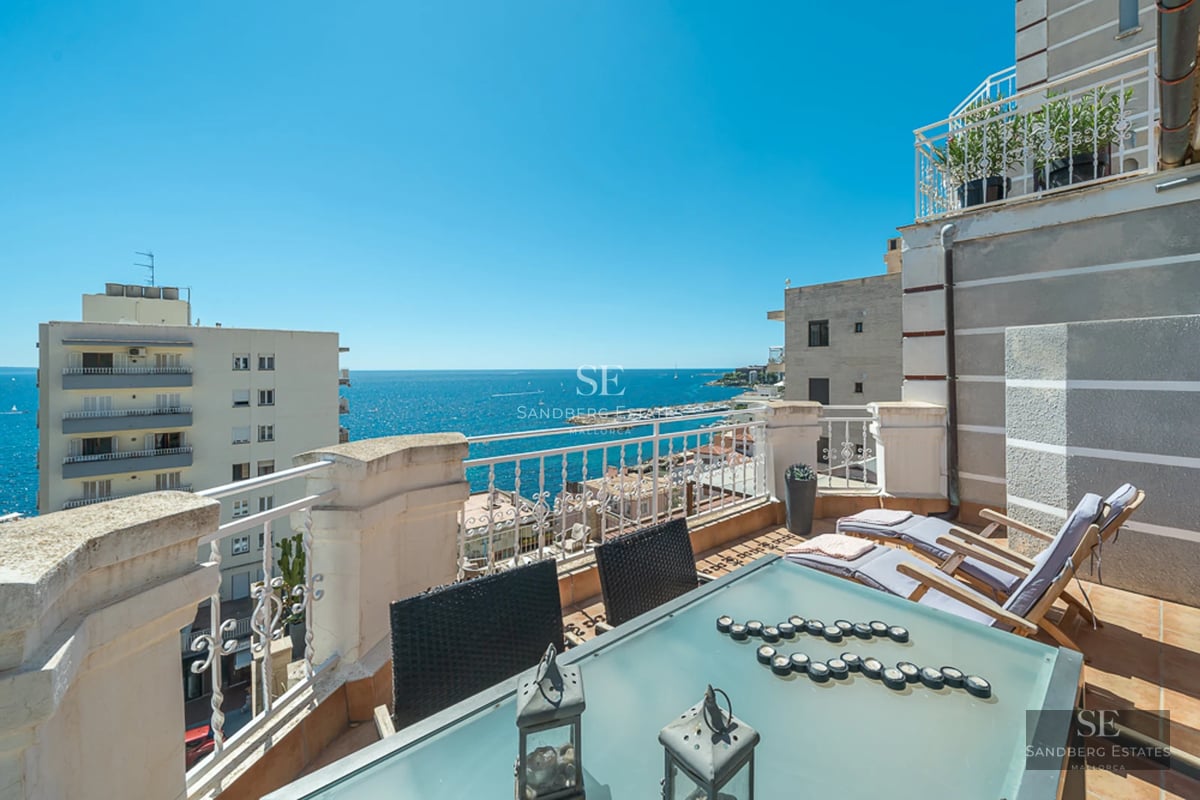 View of a modern villa featuring an infinity pool, lush garden, and minimalist architectural design. Soft lighting and relaxing atmosphere.