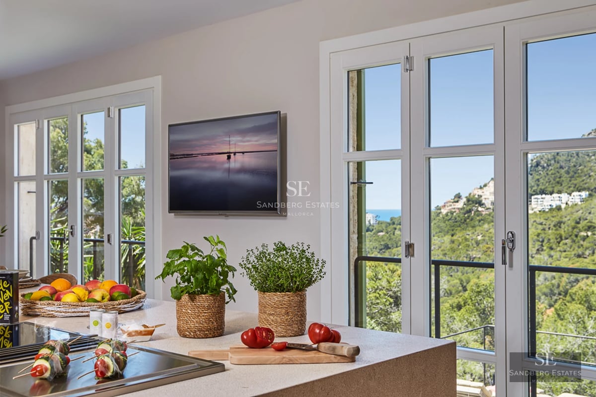 Spacious exterior with pool, sun loungers, and landscaped area. Modern and relaxing design for enjoying the outdoors.