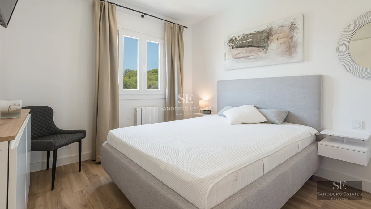 Modern exterior with pool, garden, and large windows. Minimalist design with clean lines and abundant natural light.