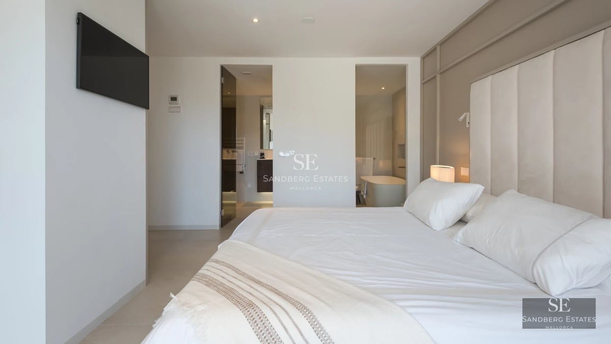 Exterior view of a modern villa with reflecting pool, expansive terraces, and lush greenery. Minimalist architecture, elegant design.