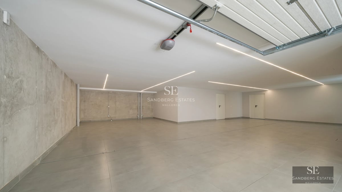 Exterior view of a modern villa with a pool, large windows, and minimalist design. Landscaping details and high-quality finishes.