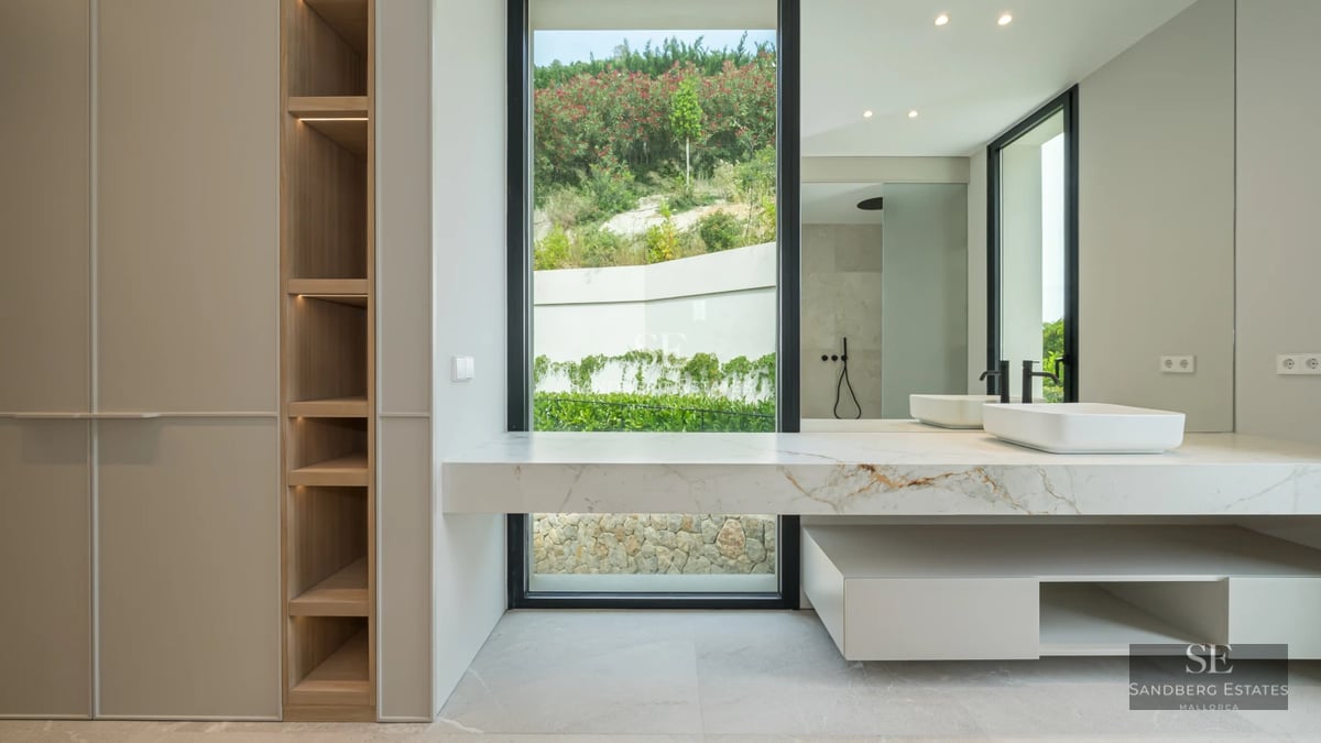 Modern penthouse with balcony, sea view, and pool. Minimalist interior, wooden floors, and abundant natural light.