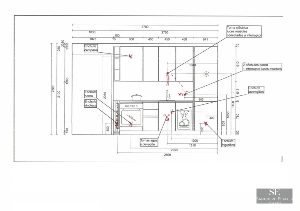 Technical drawing of a kitchen layout with measurements and markings for electrical and plumbing connections.
