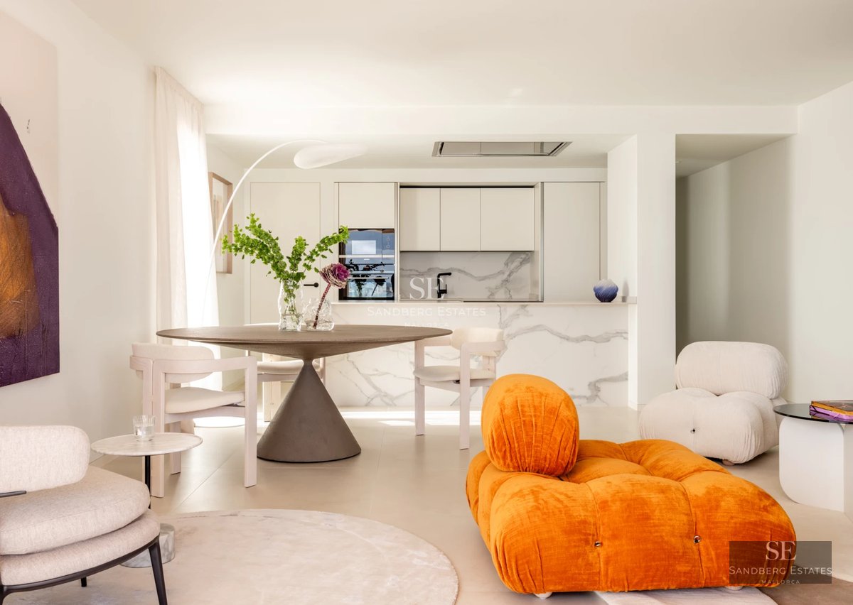 Pool and terrace view of modern villa. Clean architecture, infinity pool, ample outdoor space. Luxury and comfort.