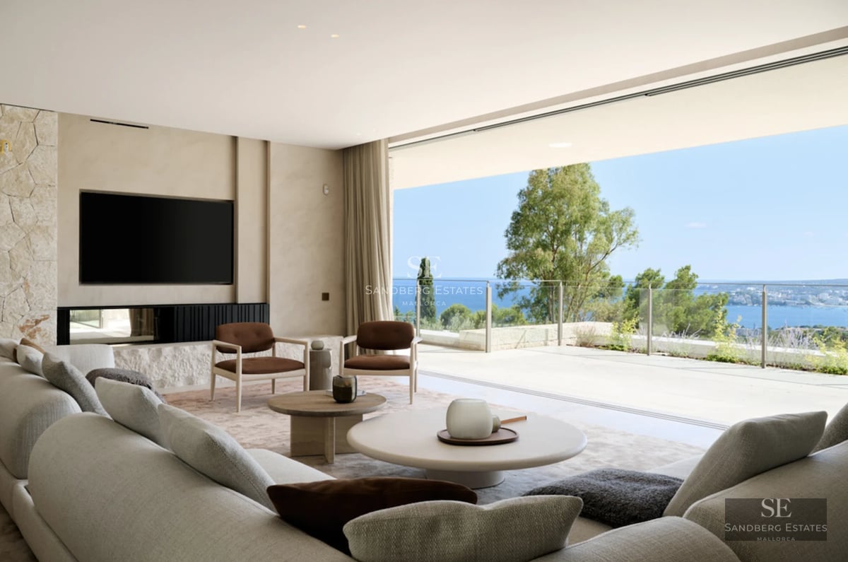 Spacious terrace with infinity pool and panoramic views. Modern design, elegant furniture, and lush surrounding vegetation.