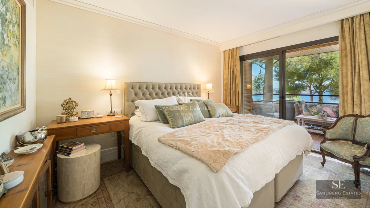 Exterior of a modern villa featuring a pool, large windows, and a lush garden. Minimalist and elegant design.