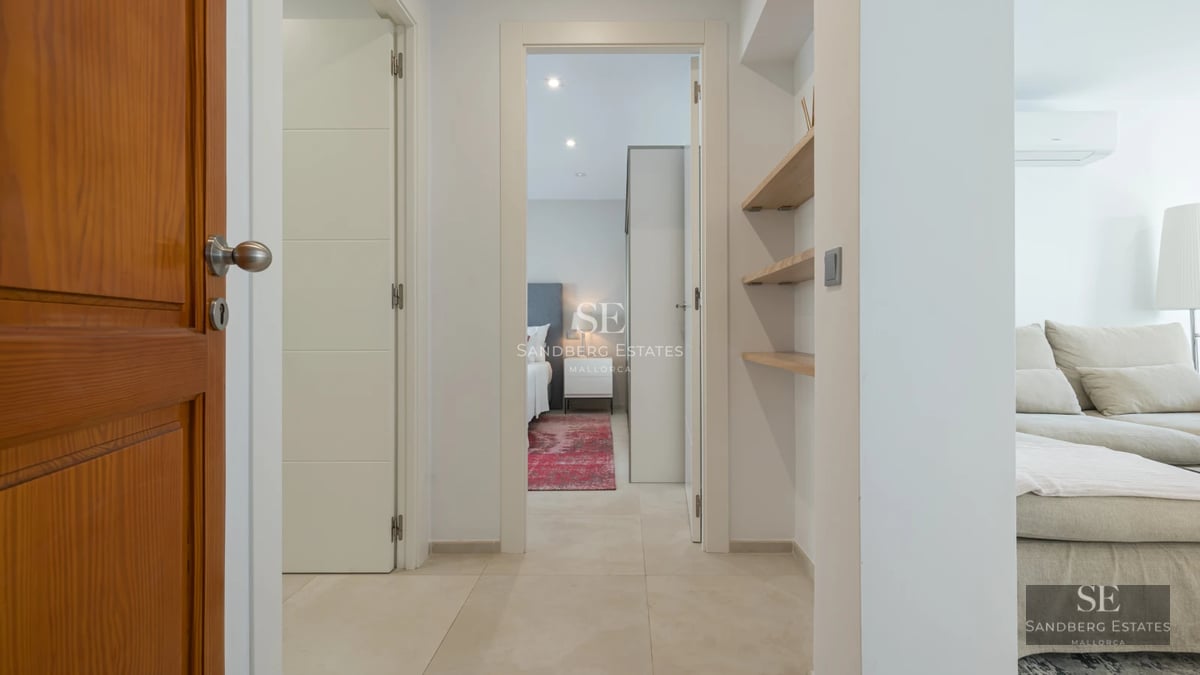 Exterior view of a modern house featuring a swimming pool, lush garden, and minimalist architecture. Warm and elegant lighting.