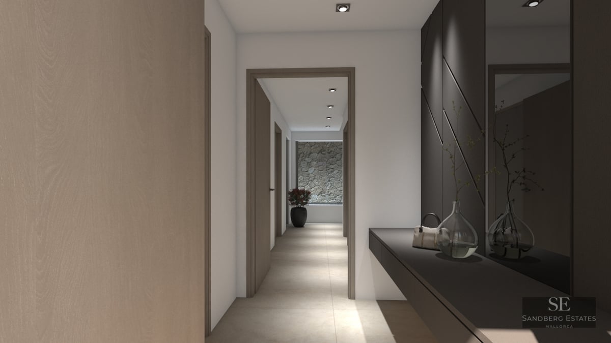 A sleek modern hallway featuring light wood doors, a dark console, a large mirror, and a stone feature wall at the end.