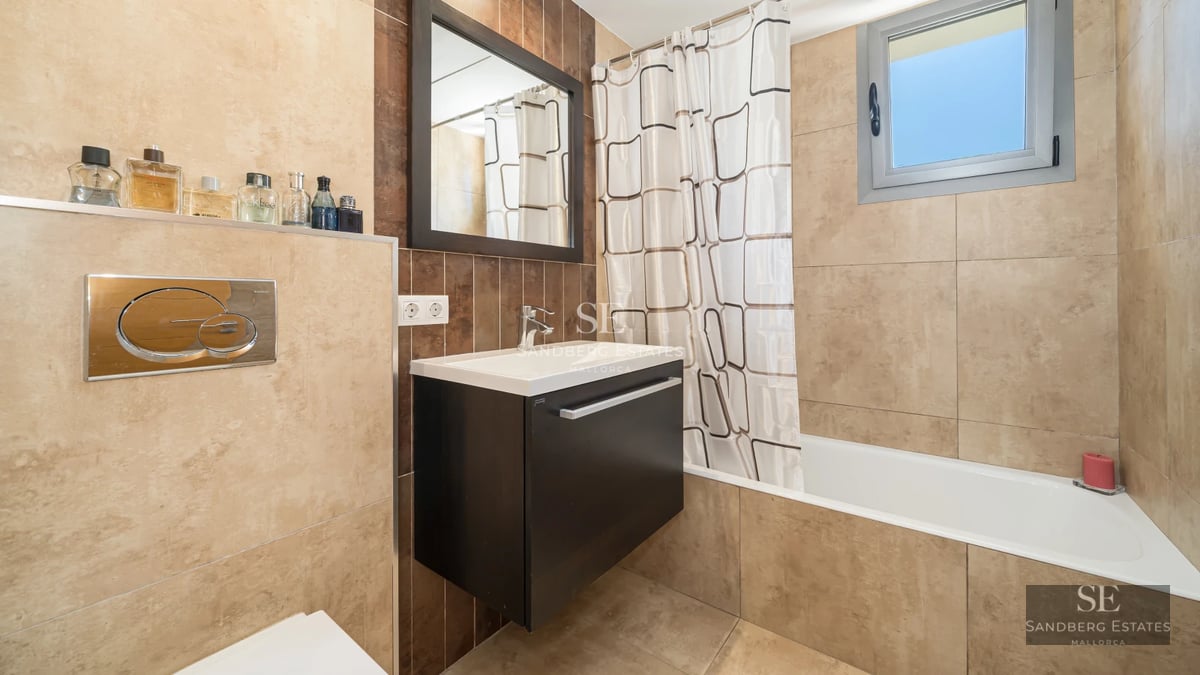 Exterior view of a modern villa with infinity pool, large windows, and lush landscaping. Contemporary architecture.