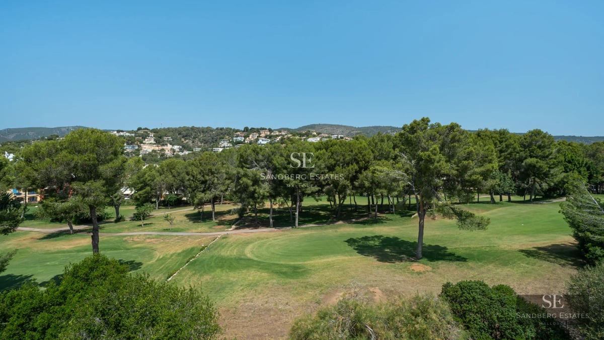 Exterior view of modern villa with infinity pool, lush garden, and expansive terraces. Minimalist, elegant, and bright architecture.