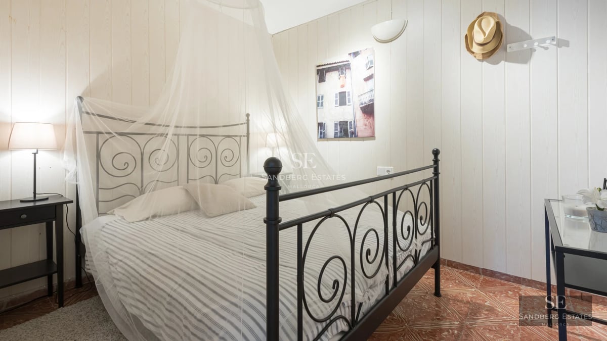 Spacious terrace with pool, sun loungers, and panoramic views. Modern design with elegant furnishings and lush vegetation.