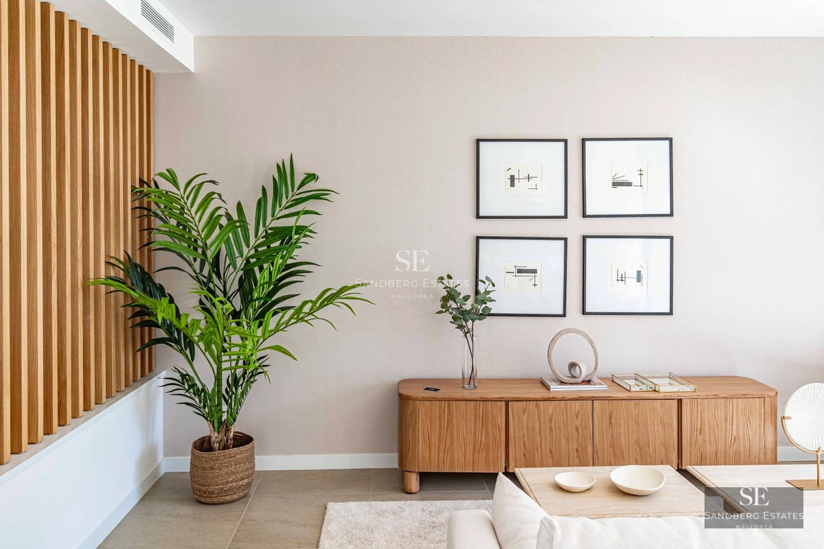 Exterior view of a modern villa featuring a pool, lush garden, and minimalist architecture. Ideal for families.