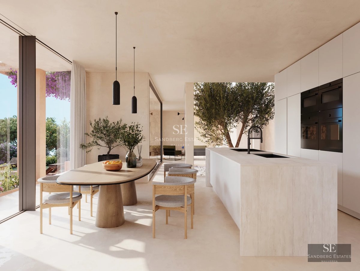 Spacious terrace with infinity pool, sea views, and modern furniture. Minimalist design with wood and natural stone accents.