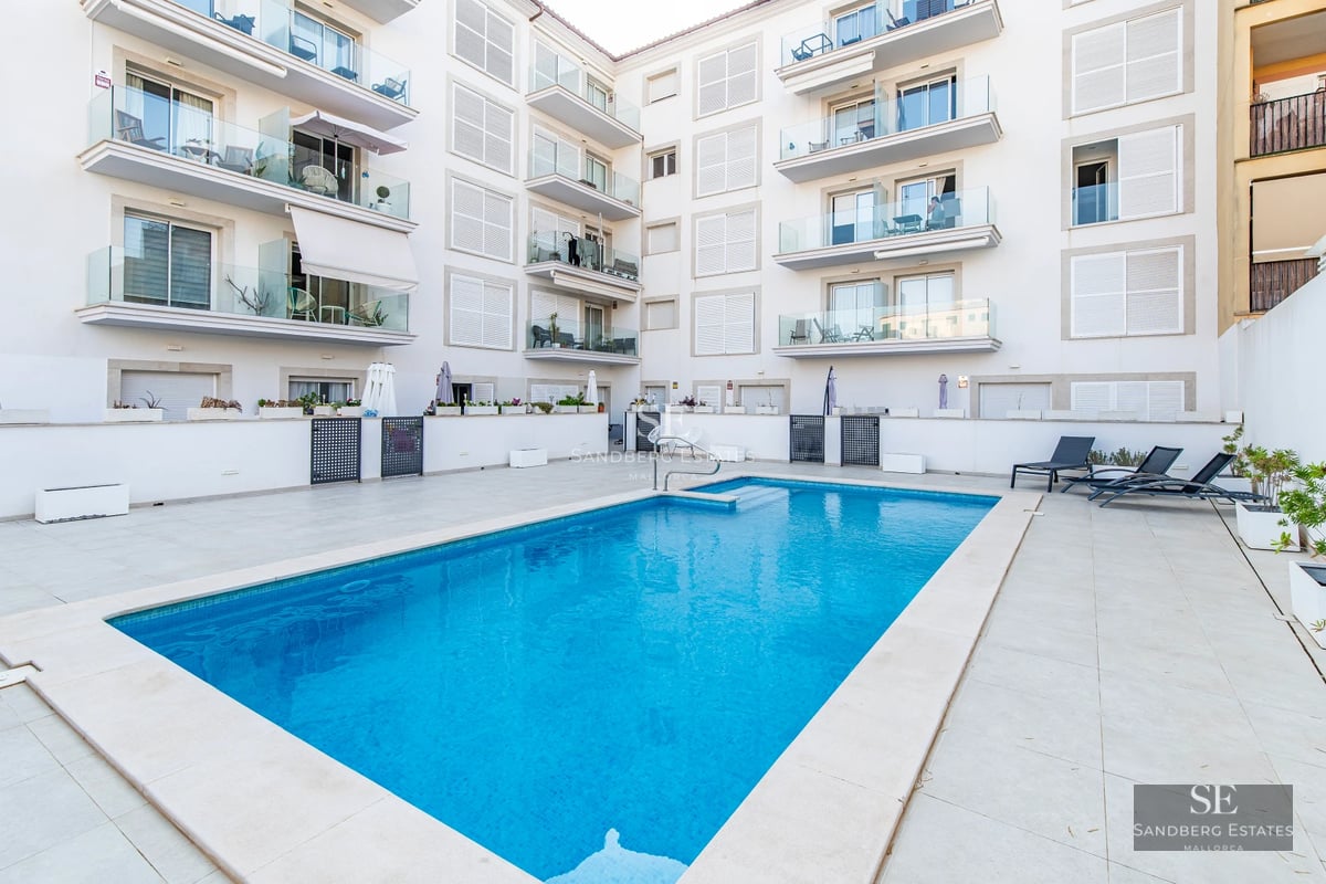 Exterior of modern home with pool. Minimalist design, large windows, lush greenery. Soft lighting.