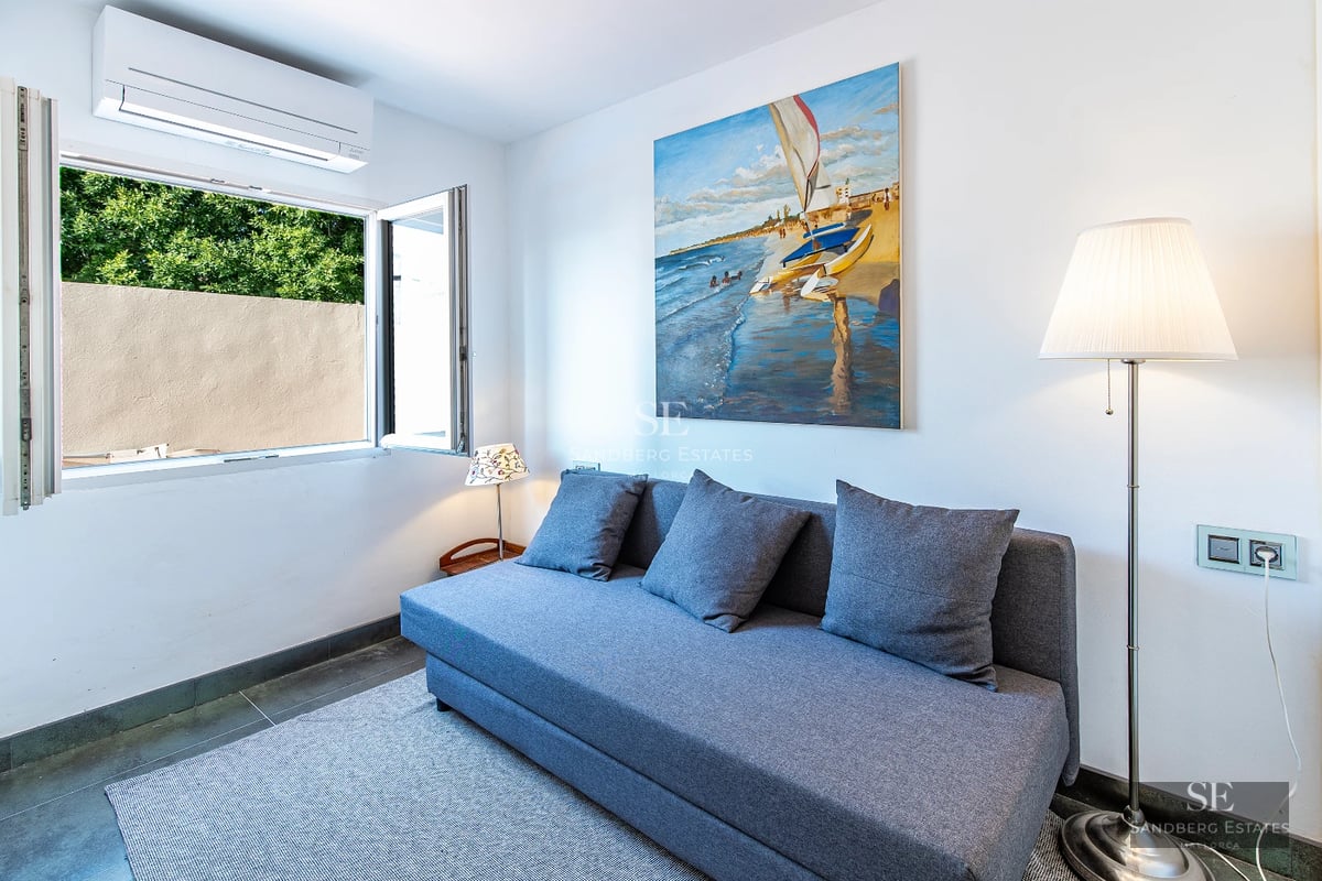 Exterior view of a modern villa with swimming pool, garden, and terrace. Minimalist architecture, large windows, and high-quality finishes.