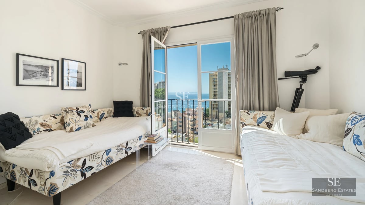 Spacious terrace with infinity pool, sun loungers, and panoramic sea views. Modern design with natural materials and abundant natural light.