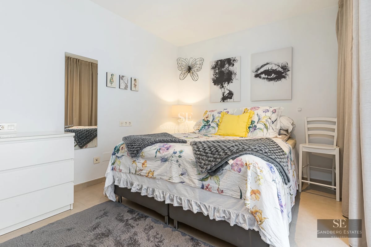 Spacious terrace with infinity pool and sea views. Modern design with stylish outdoor furniture. Warm ambient lighting.