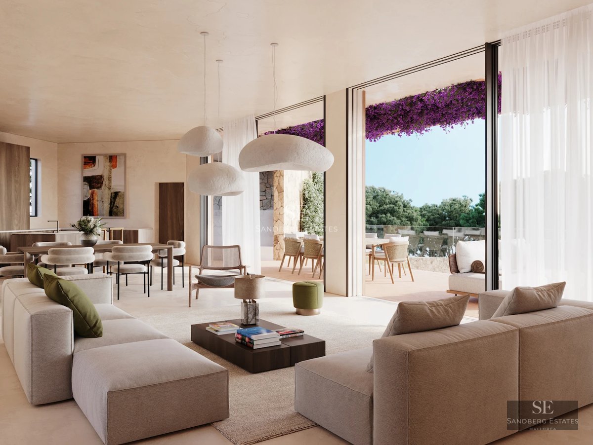 View of a modern villa with infinity pool. Minimalist architecture, large windows and terrace with sea view.