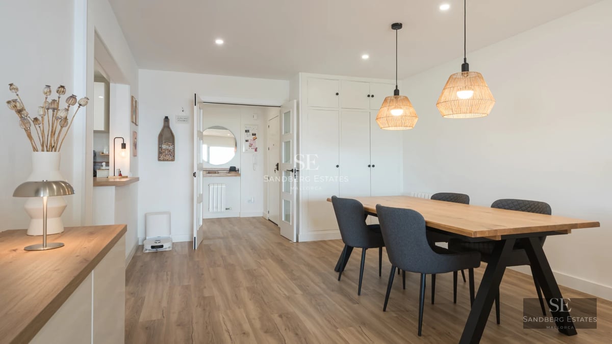 View of infinity pool, lush garden, and modern villa facade. Minimalist architecture, luxury finishes. Natural lighting.