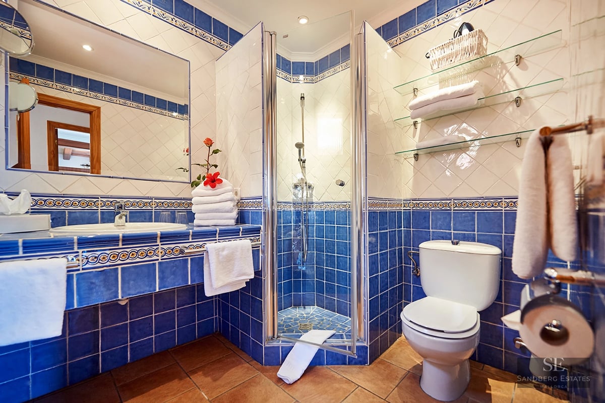 Spacious terrace with modern furniture, panoramic views, and lush greenery. Ideal for relaxation and enjoying the outdoors.