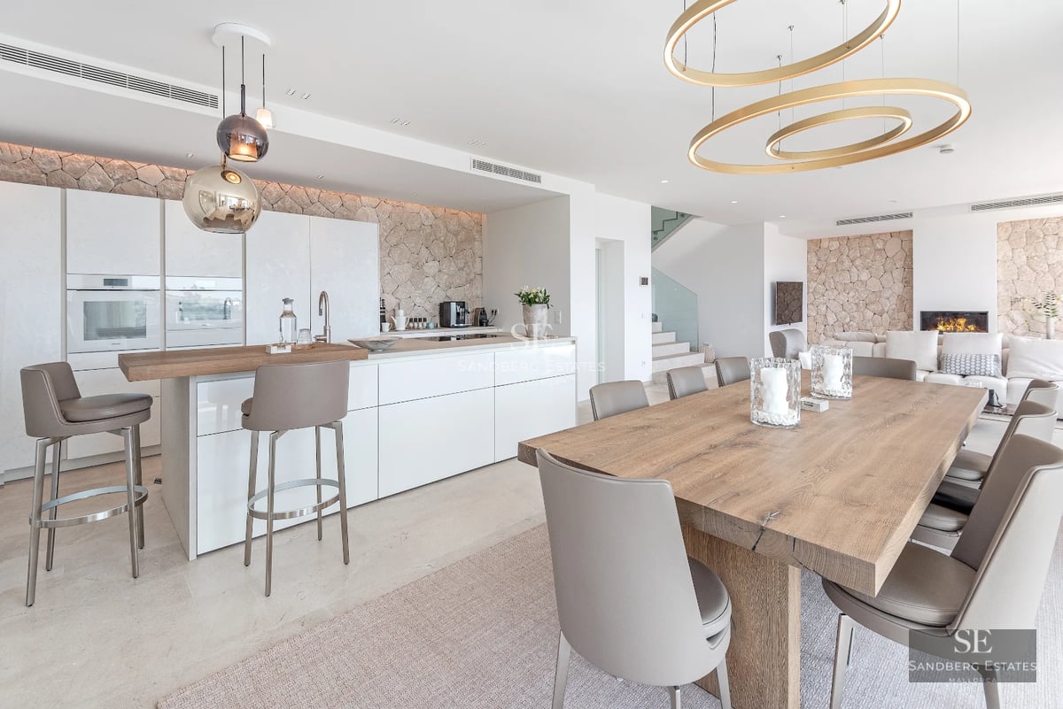 Exterior of modern villa with infinity pool, lush greenery, and minimalist architecture. Open spaces and natural light.