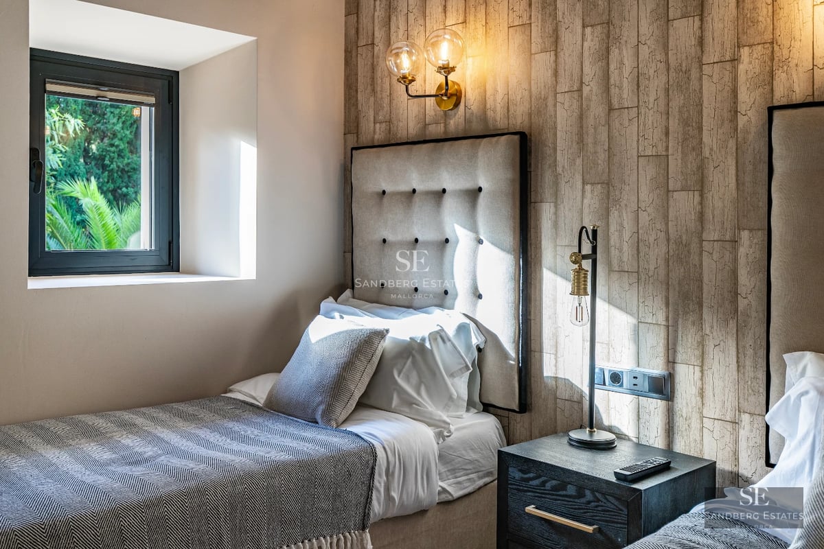 Modern exterior featuring reflecting pool, expansive windows, and minimalist landscaping. Soft ambient lighting.