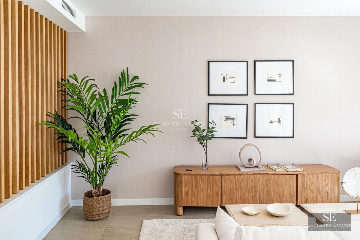 Spacious terrace with infinity pool, sun loungers, and panoramic sea views. Modern design with clean lines and high-quality materials.